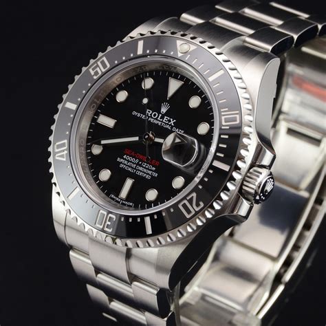 rolex sea dweller red writing